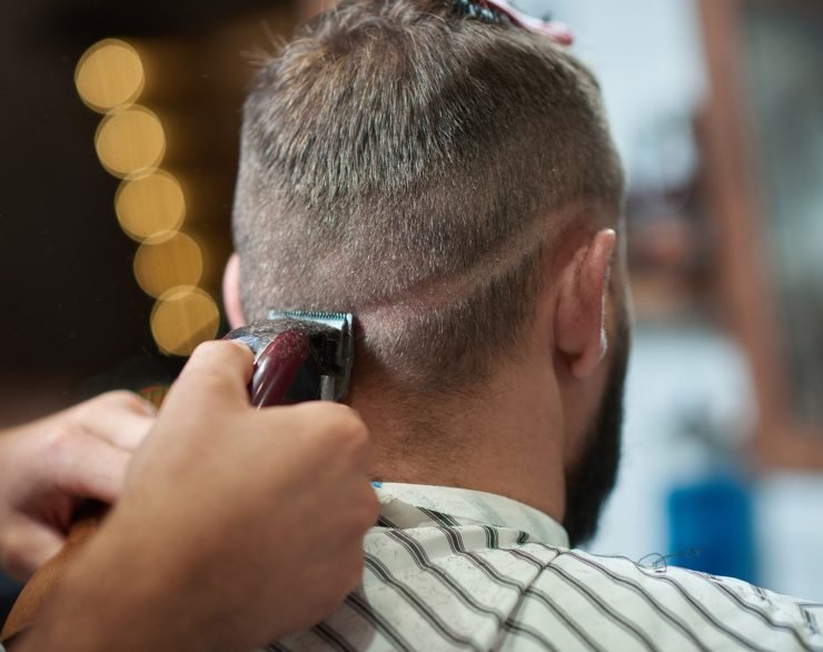 young-man-at-the-barbershop-R8325N8.jpg